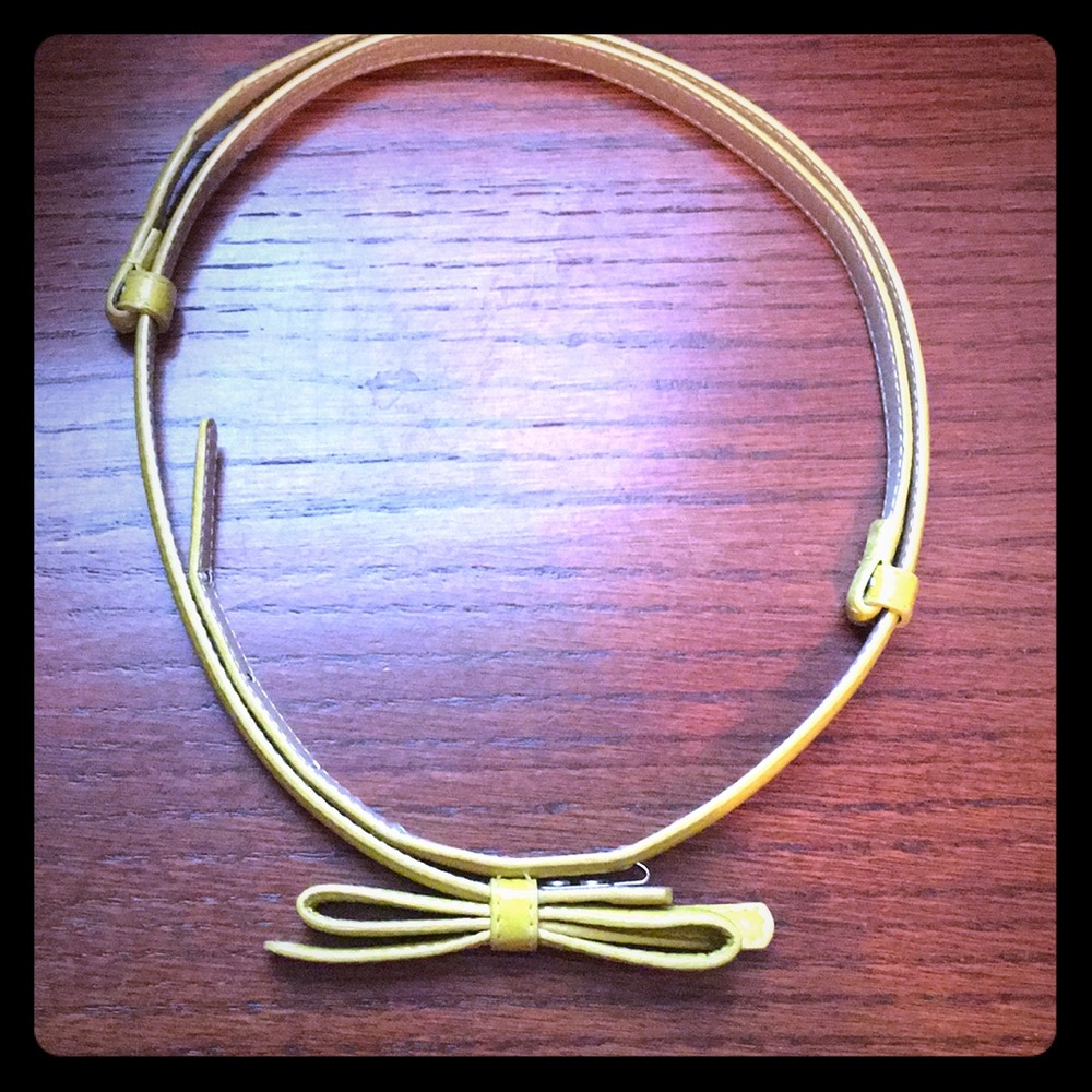 Express yellow bow belt